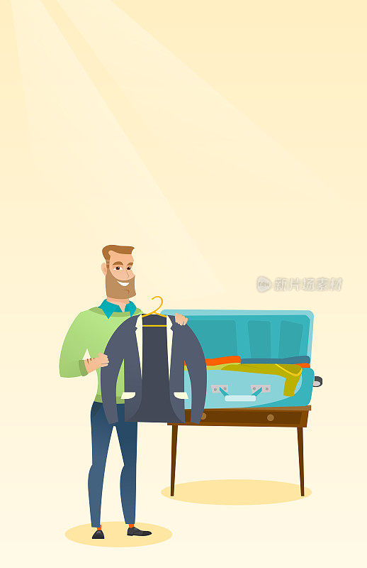Caucasian man packing clothes in a suitcase
